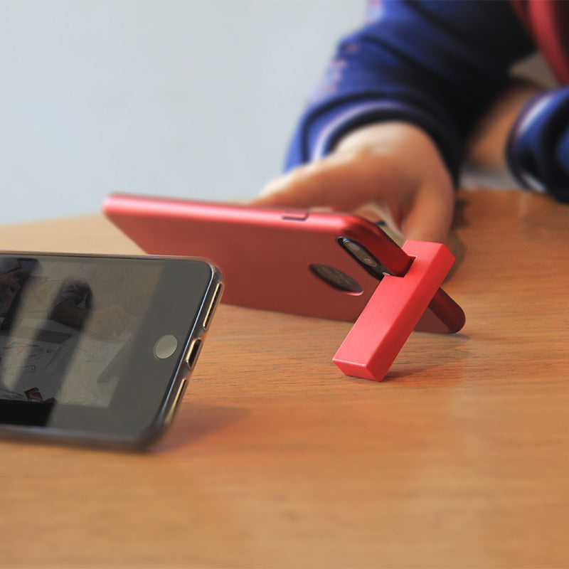 Minimalist Magnetic Phone holders. Pull apart, snap together.