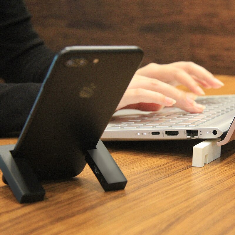 Minimalist Magnetic Phone holders. Pull apart, snap together.